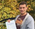  Ben with Driving test pass certificate